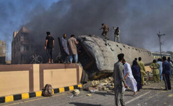 Train explodes into fireball after Pakistan 'suicide bomb' attack with at least 24 dead