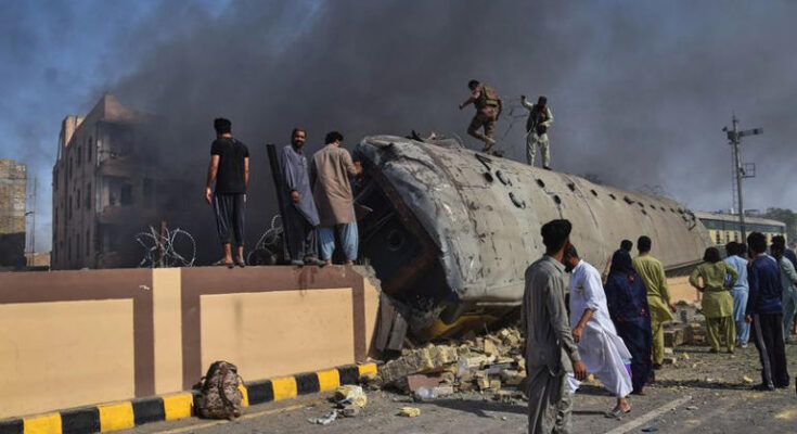 Train explodes into fireball after Pakistan 'suicide bomb' attack with at least 24 dead