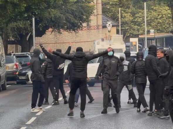 As Belfast gangs went door-to-door seeking migrants, terrified residents said: 'I'm white'
